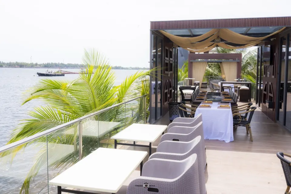 A waterfront deck set for guests