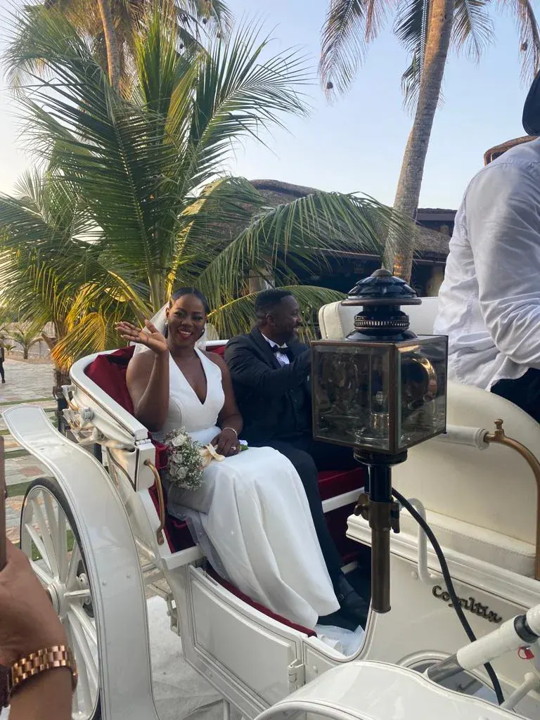 Newlyweds in a horse-drawn carriage
